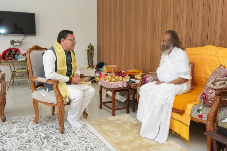 Uttarakhand Chief Minister Pushkar Singh Dhami with spiritual leader Sri Sri Ravi Shankar