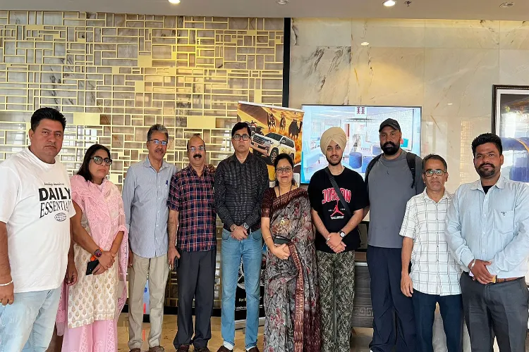 Parminder returns home