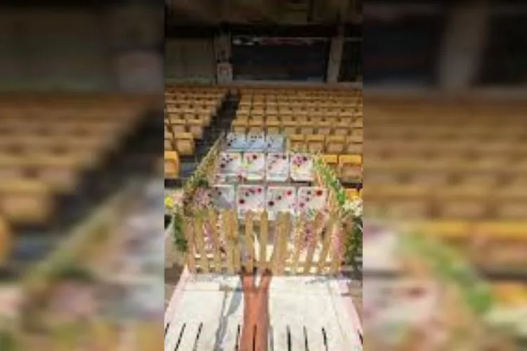 11 seats saved in rememberance of fans killed in stampede last year.