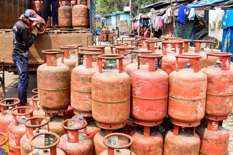 Workers unload LPG cylinder from a truck amid the reported LPG supply shortage 