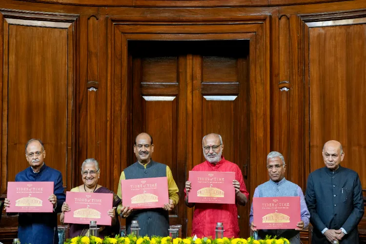 Vice President CP Radhakrishnan, second right, Lok Sabha Speaker Om Birla, second left, Deputy Chairman of the Rajya Sabha Harivansh Narayan Singh, right, and MP Sudha Murty during the launch of Murty's book Tides of Time