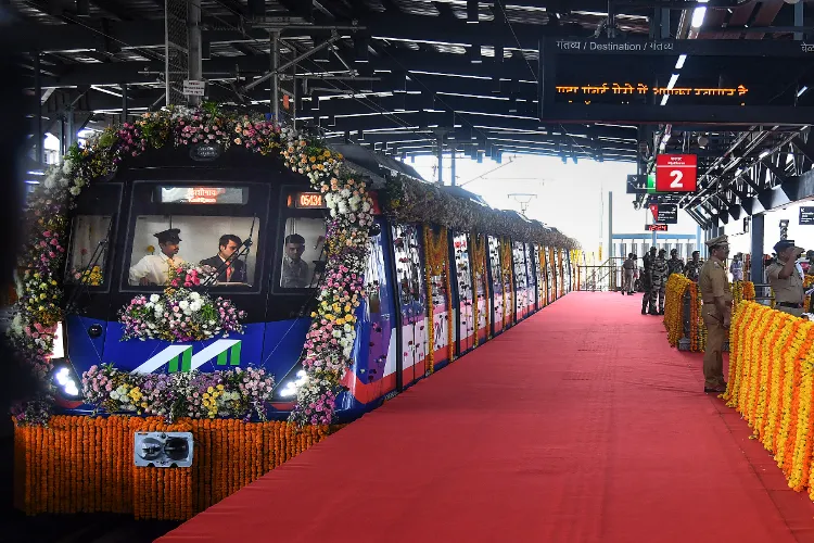 Security personnel stand guard during the inauguration of the first phase of Mumbai Metro Line 9 from Dahisar East to Kashigaon, in Mumbai