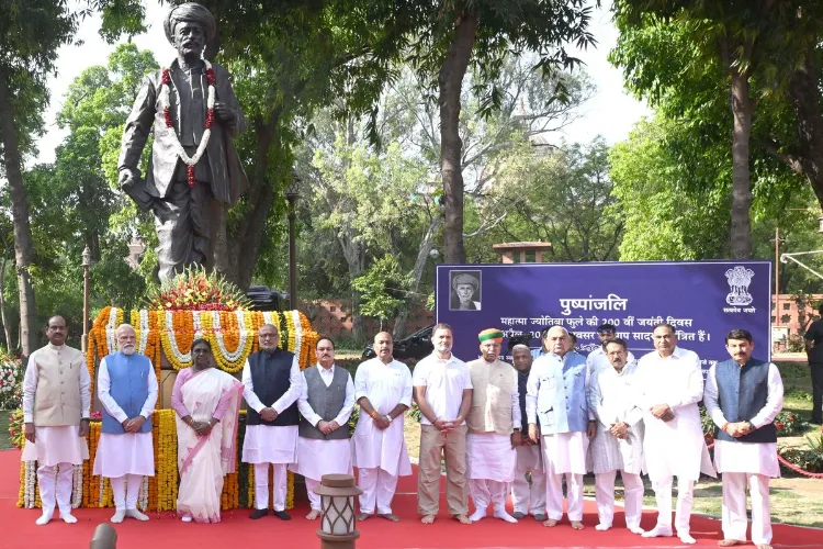 Prime Minister Narendra Modi pays floral tribute to the statue of Mahatma Jyotiba Phule during the latter's 200th birth anniversary celebration, at Prerna Sthal, Samvidhan Sadan