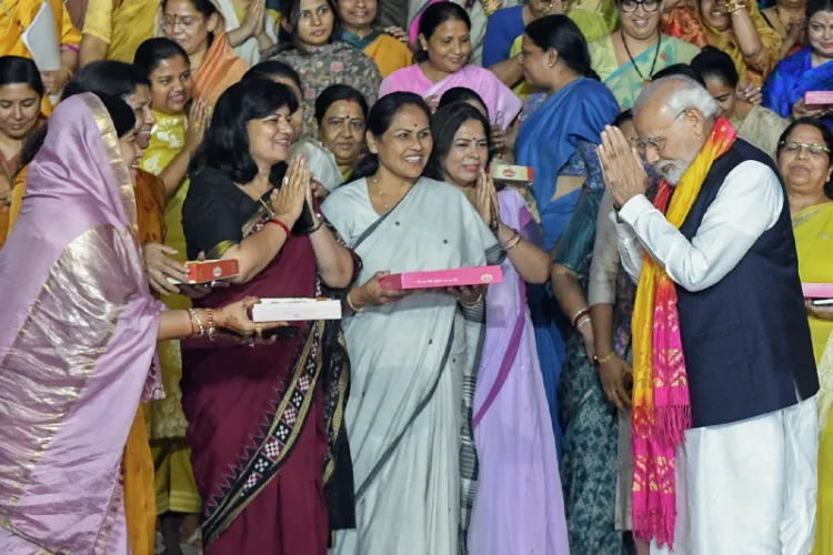 Prime Minister Narendra Modi with women MPs at the passing of Women Reservation Bill in 2023 