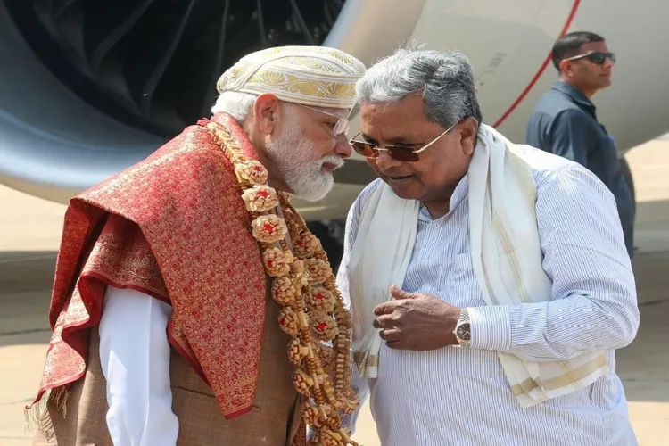 Karnataka Chief Minister Siddaramaiah with PM Modi