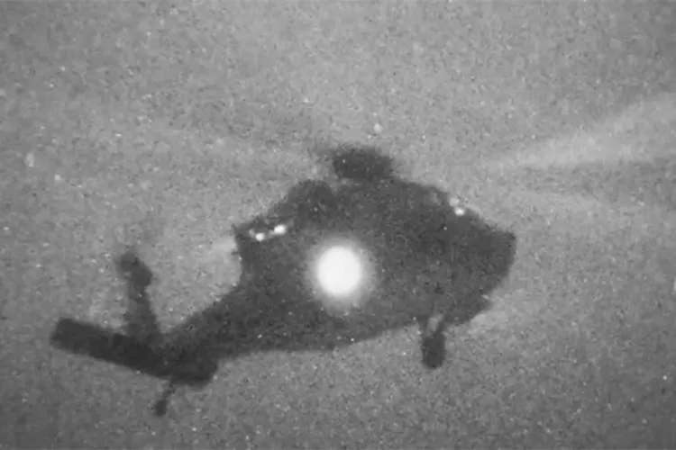 Night-vision footage released by United States Central Command shows US Marines fast-roping onto the Iranian-flagged vessel Touska during a maritime boarding operation in the Gulf of Oman.