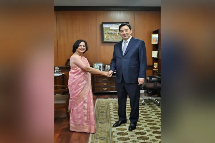 Secretary (South) at the Ministry of External Affairs, Neena Malhotra with China’s Special Envoy on the Middle East Issue, Zhai Jun 
