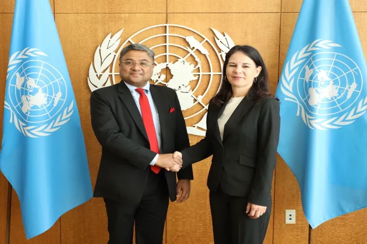 Secretary (West) in the Ministry of External Affairs, Sibi George with Annalena Baerbock