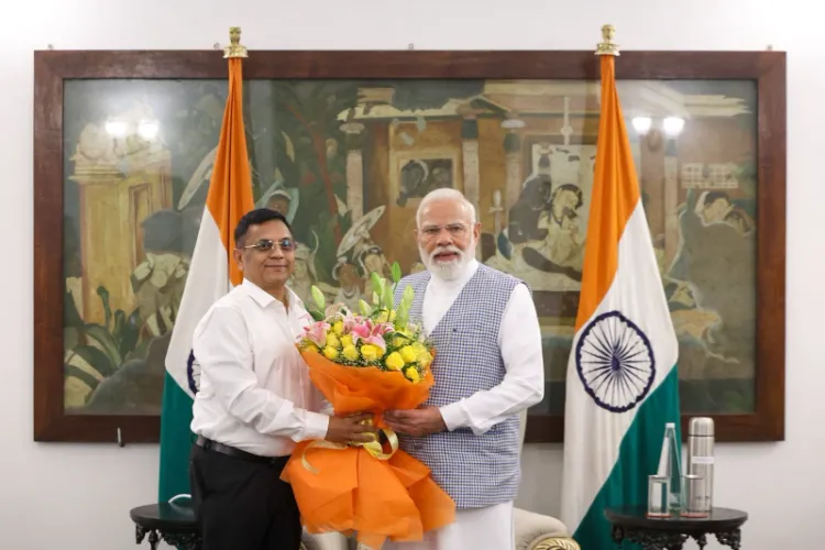 PM Narendra Modi with NITI Ayog member, Gobardhan Das