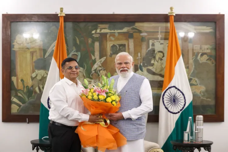 Prime Minister Narendra Modi with Newly appointed full-time member of NITI Aayog, Gobardhan Das