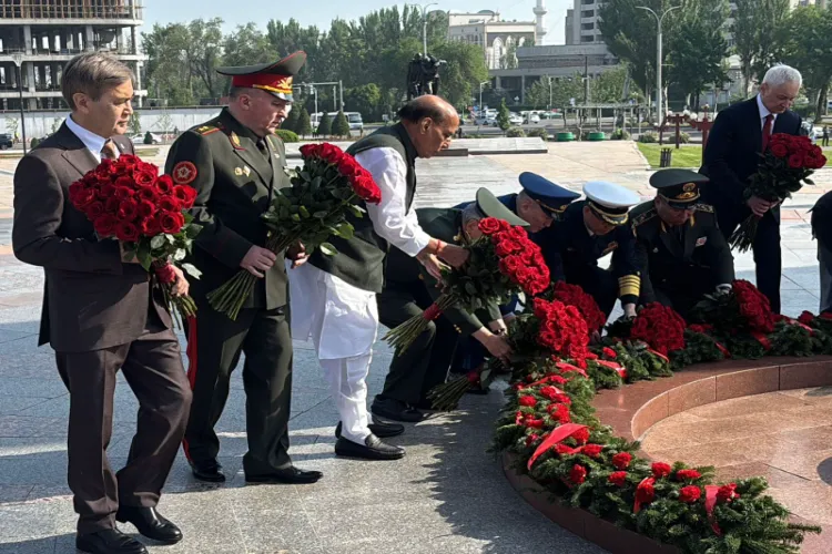 Defence Minister Rajnath Singh paying tribute to the fallen heroes by laying a wreath at Victory Square in Bishkek