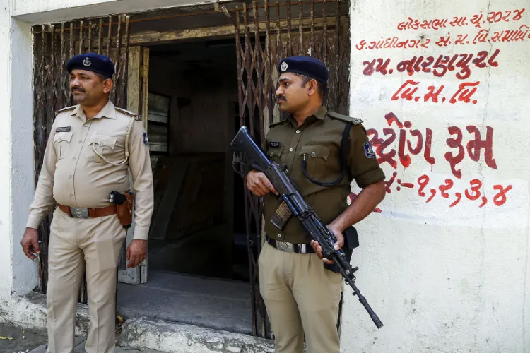 Police personnel stand guard image.