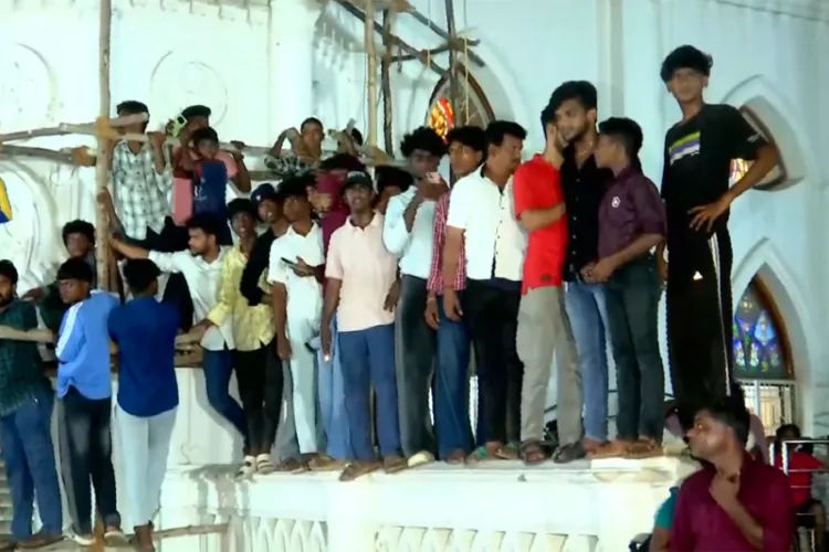 TVK chief Vijay's supporters waiting for the mega star's arrival near Basilica 