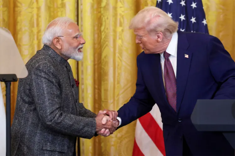 US President Donald Trump and Prime Minister Narendra Modi exchange a handshake during a joint press interaction at the White House in Washington, DC.