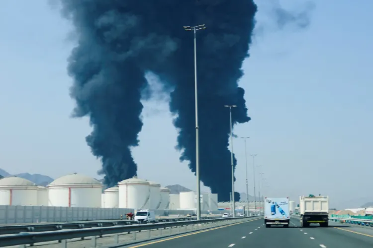 Smoke rises in the Fujairah Oil Industry Zone after debris from a drone intercepted by air defences fell in the area, according to the Fujairah media office, amid the US-Israel conflict with Iran, in Fujairah, United Arab Emirates.