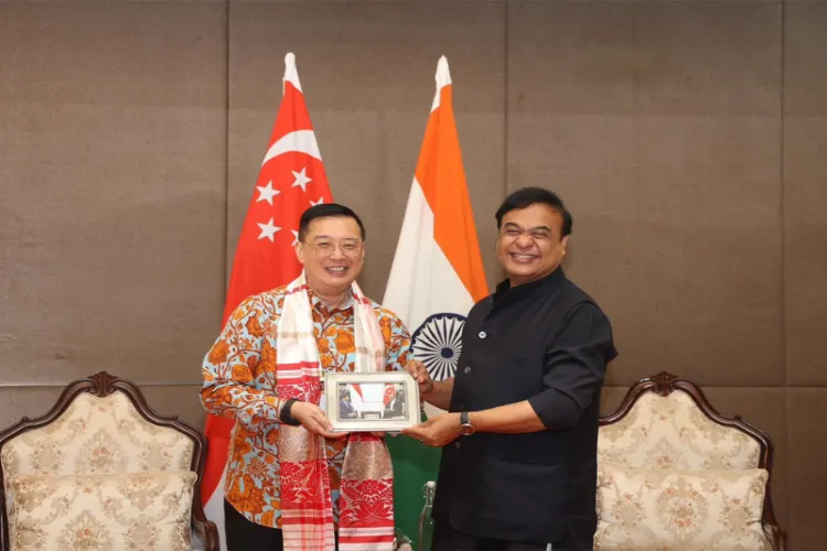 Assam Chief Minister-designate Himanta Biswa Sarma and Singapore HC Simon Wong 