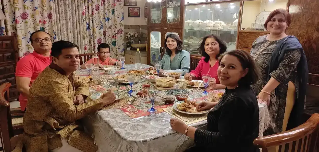 An Assamese Muslim family having meals on Eid