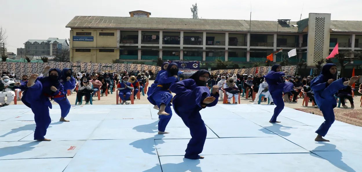 Muslim girls practising martial arts in Kashmir