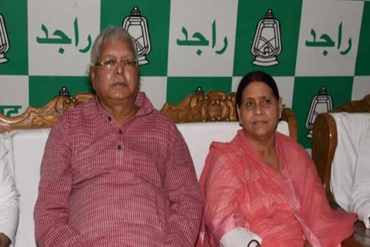 RJD leaders Lalu Prasad and Rabri Devi