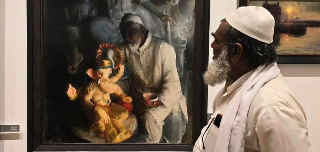 A Muslim man looking at Pramod Kurlekar's 'The Nurturer'