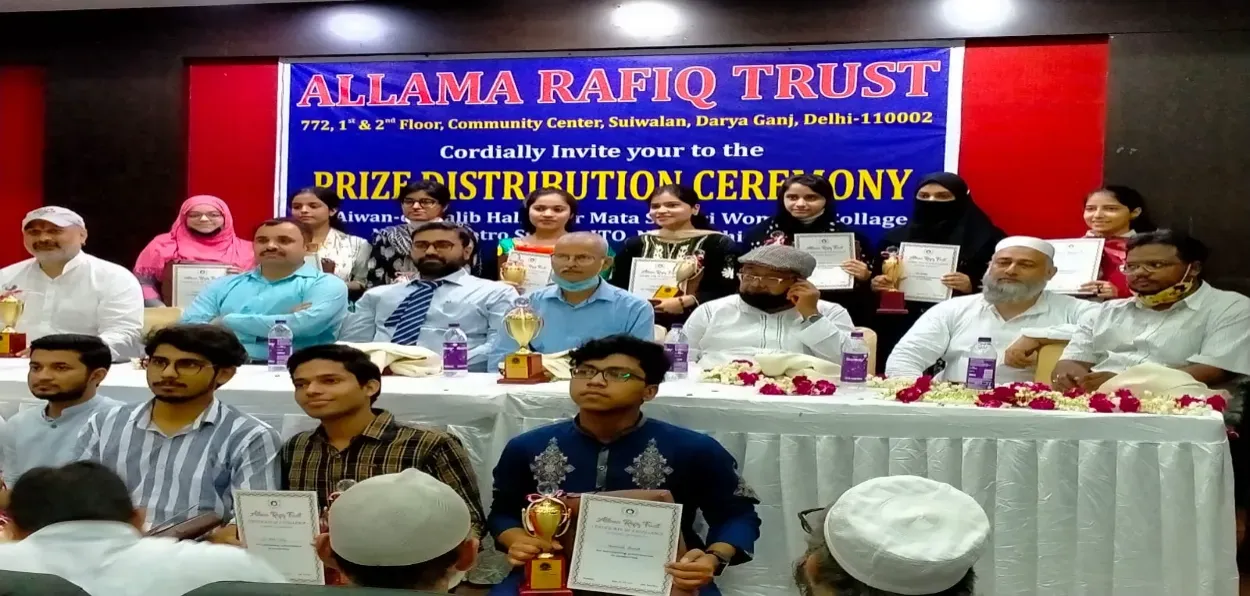  Maqsood Ahmed, (Second from Left in second row) the founder of Allama Rafiq Trust with women who completed their courses from his Trust