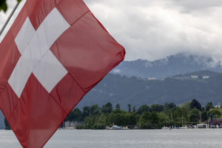 A Swiss flag is pictured in front of the Burgenstock Resort in Lucerne, Switzerland
