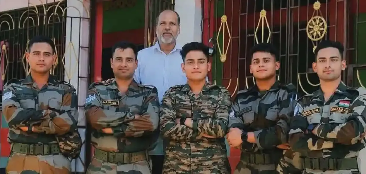 Tasir Ali with his five sons donning uniforms