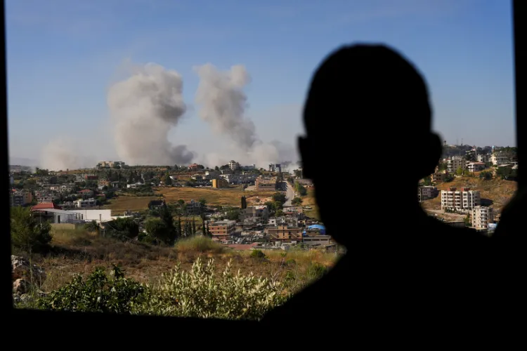 Smoke billows from southern Lebanon following an Israeli strike, as seen from Nabatieh