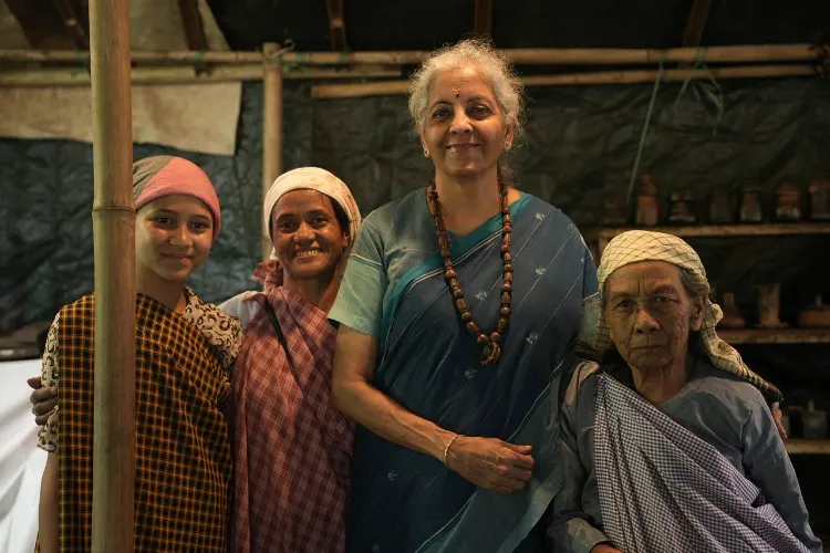 Finance Minister Nirmala Sitharaman with black clay pottery artisans of Meghalaya