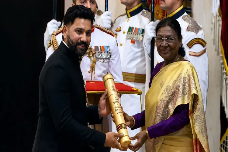 Indian Cricketer Rohit Sharma receives the Padma Shri from President of India Droupadi Murmu.