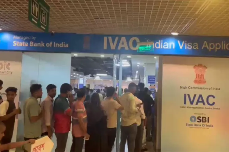 Applicants queue outside the Indian Visa Application Centre (IVAC) at Jamuna Future Park in Dhaka after the resumption of Indian tourist visa services.