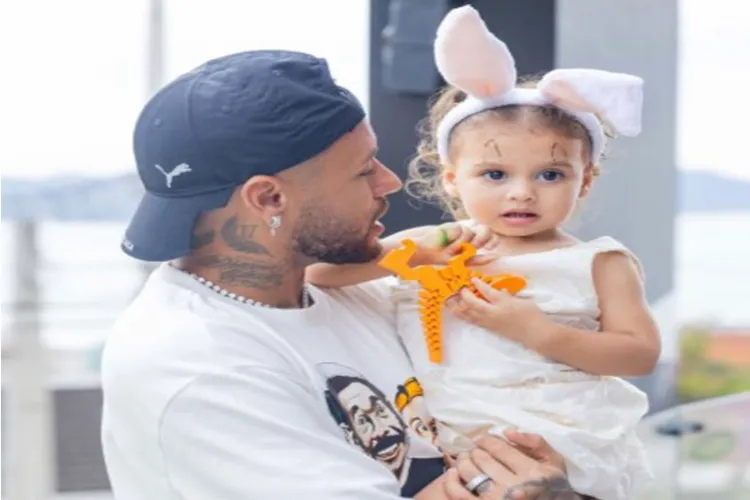 Neymar with daughter Helena.
