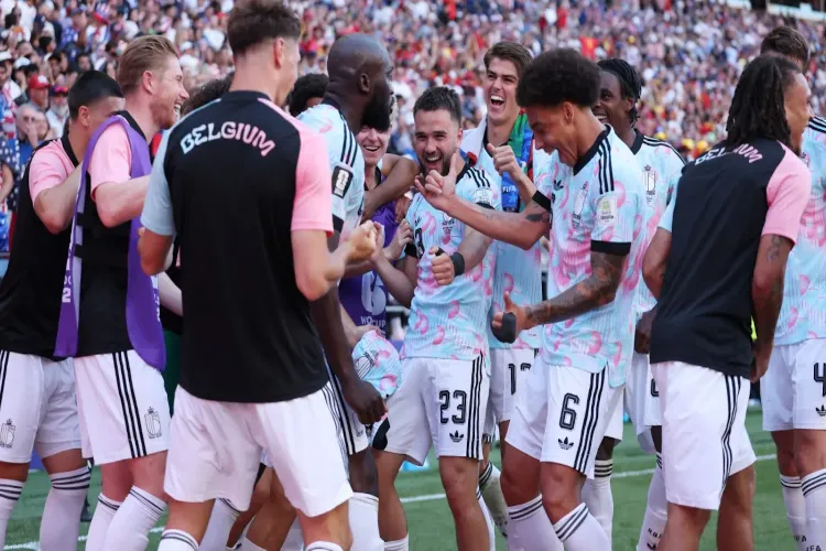 Belgium players dancing after win