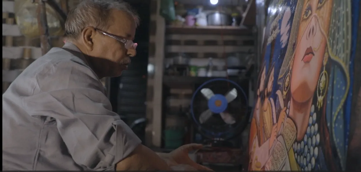 Painter Kafeel working on an oil painting