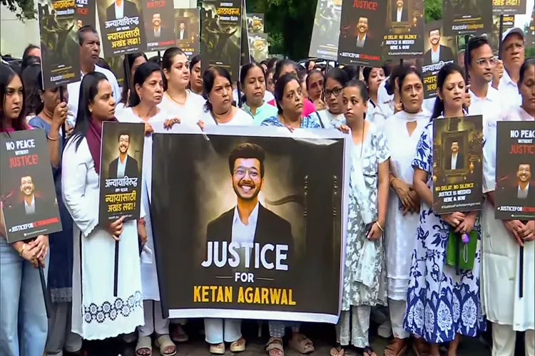 Ketan Agarwal's family members and society residents hold a candlelight march 