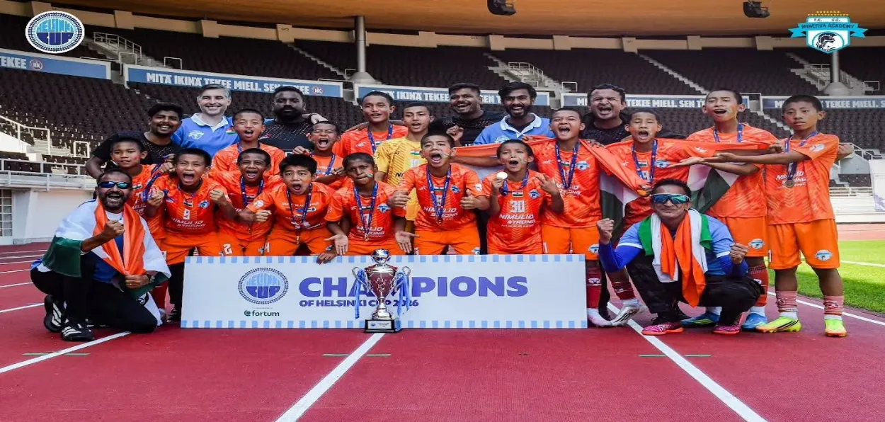 Minerva Football FC team with the Helsinki Cup  
