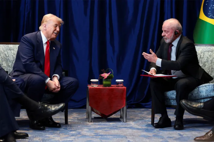 U.S. President Donald Trump and Brazilian President Luiz Inacio Lula da Silva talk as they meet on the sidelines of the 47th Association of Southeast Asian Nations (ASEAN) summit in Kuala Lumpur, Malaysia, October 26, 2025.