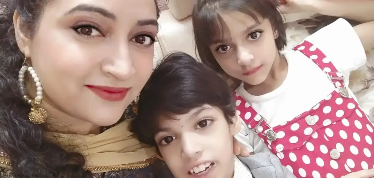 Alia Mariam with her children