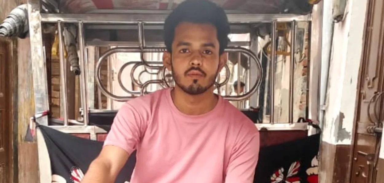 Mohammad Suhail in his e-rickshaw