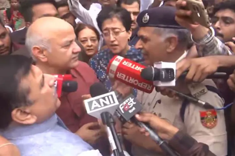 Senior Aam Aadmi Party (AAP) leaders Manish Sisodia, Sanjay Singh, and Atishi, along with party workers, during the ‘Cockroach Janta protest’ 