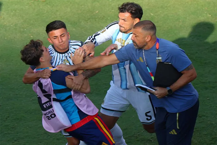 Argentina's Leandro Paredes clashes with Spain's Gavi after the match as Spain wins the World Cup