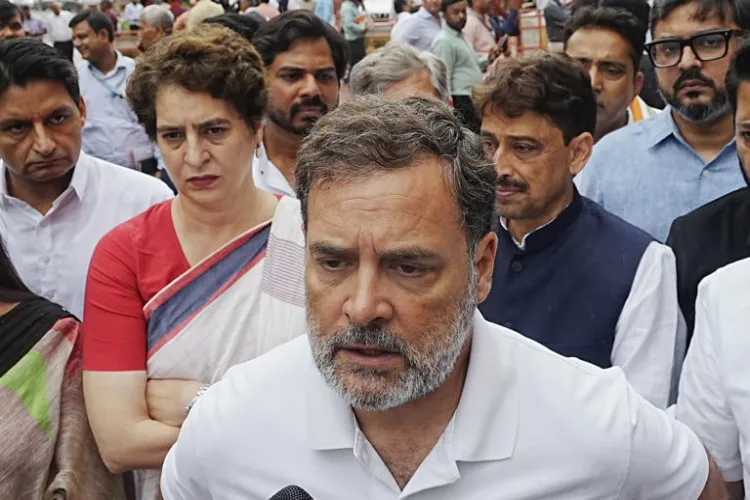 Opposition MPs, including Congress leaders Rahul Gandhi and Priyanka Gandhi Vadra protesting in the Parliament House complex