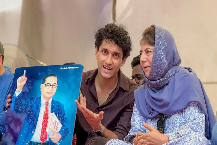 PDP president Mehbooba Mufti, right, with CJP chief spokesperson Saurav Das during the ongoing protest over the alleged NEET-UG examination irregularities at Jantar Mantar, in New Delhi