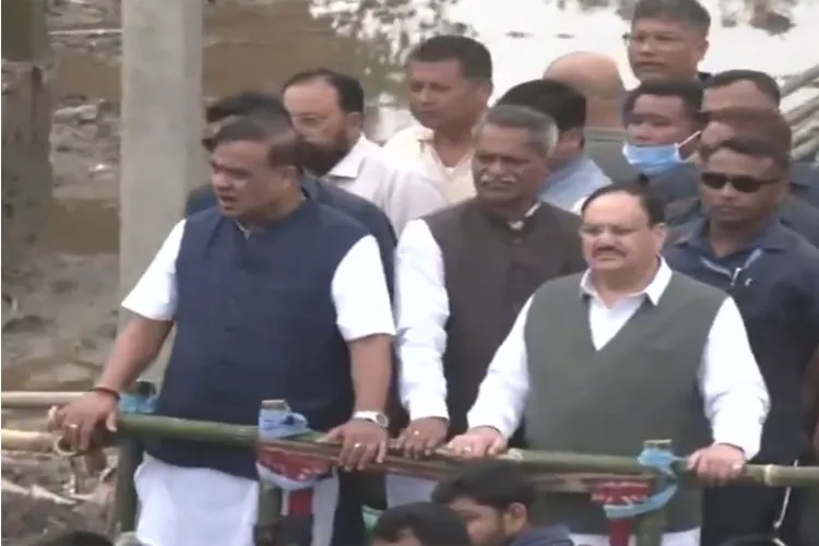 Union Health Minister JP Nadda and Assam Chief Minister Himanta Biswa Sarma inspect flood-affected areas in Sivasagar district, Assam.