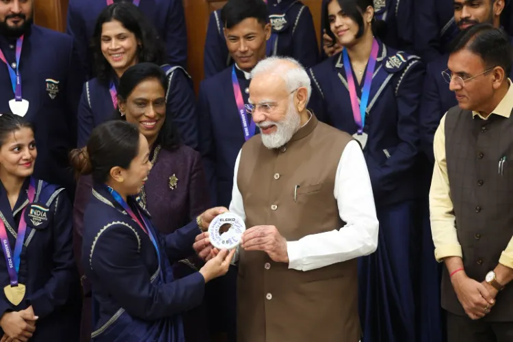 Prime Minister Narendra Modi with boxer Lovlina Borgohain 