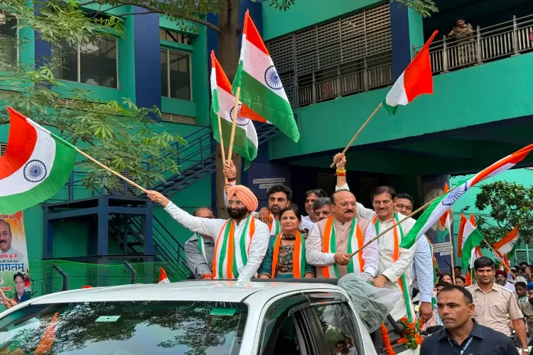 Delhi Cabinet ministers and MLAs participating in a Tiranga Yatra organised at the Delhi Legislative Assembly premises 