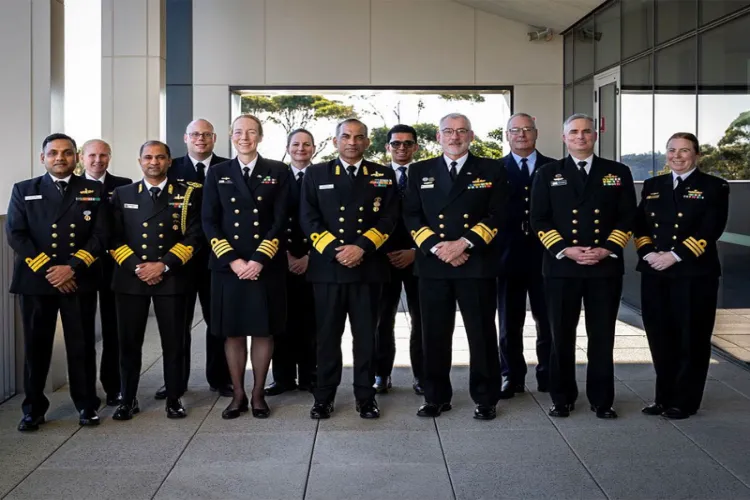 Indian and Australian Navy officials pose for a group photograph during the 17th Navy-to-Navy Staff Talks in Sydney, Australia.