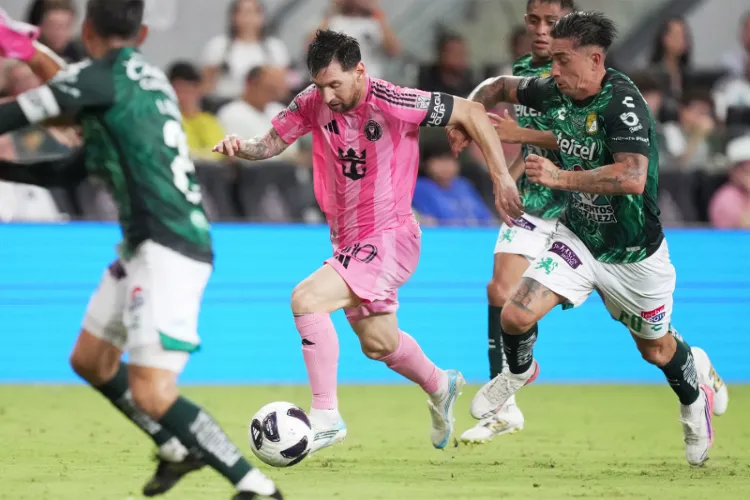 Aug 12, 2026; Miami, FL, USA; Inter Miami CF offense Leo Messi (10) breaks free from León defender Rodrigo Echeverria (20) during the second half of the Leagues Cup Phase One match at Nu Stadium. 