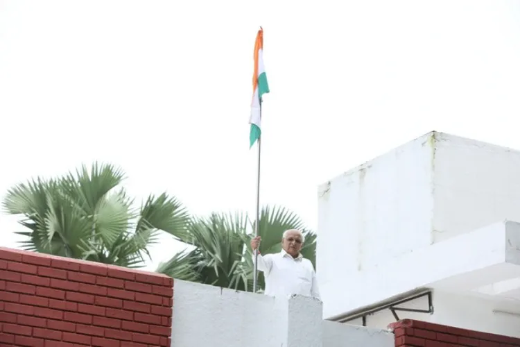 Gujarat CM Bhupendra Patel hoists tricolour at his residence 
