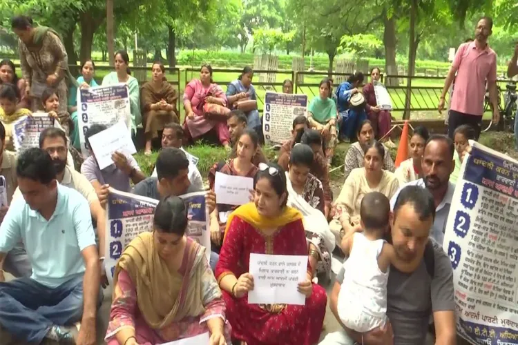Elementary teachers protest outside Harpal Cheema's residence
